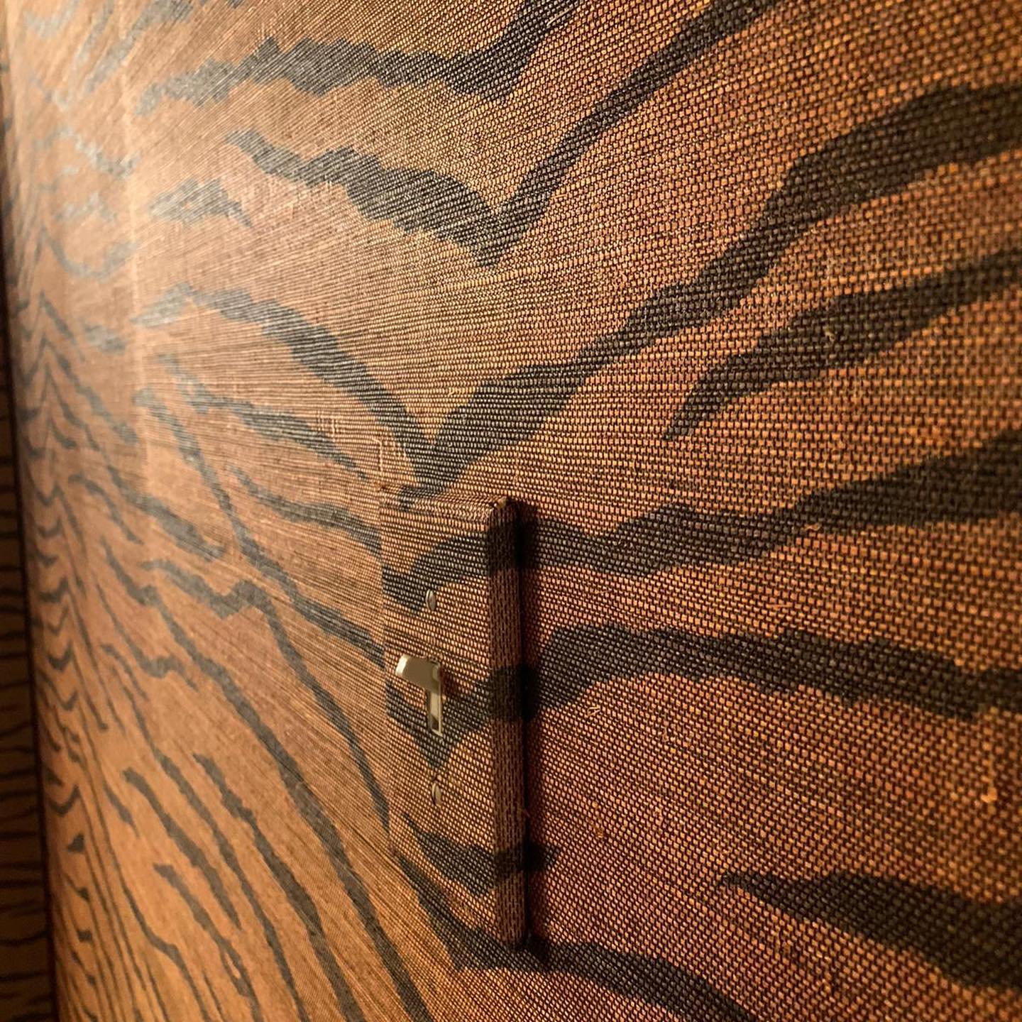 Professional wallpaper craftsmanship in an interior space