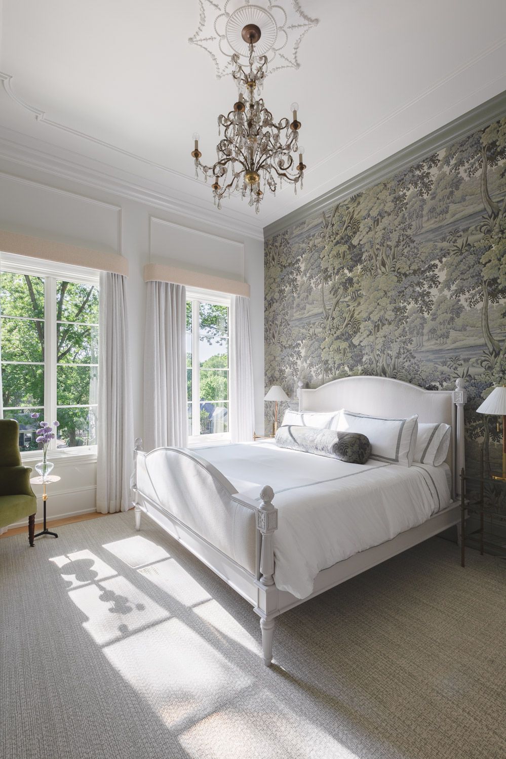 Wallpapered bedroom with an elegant architectural feature wall